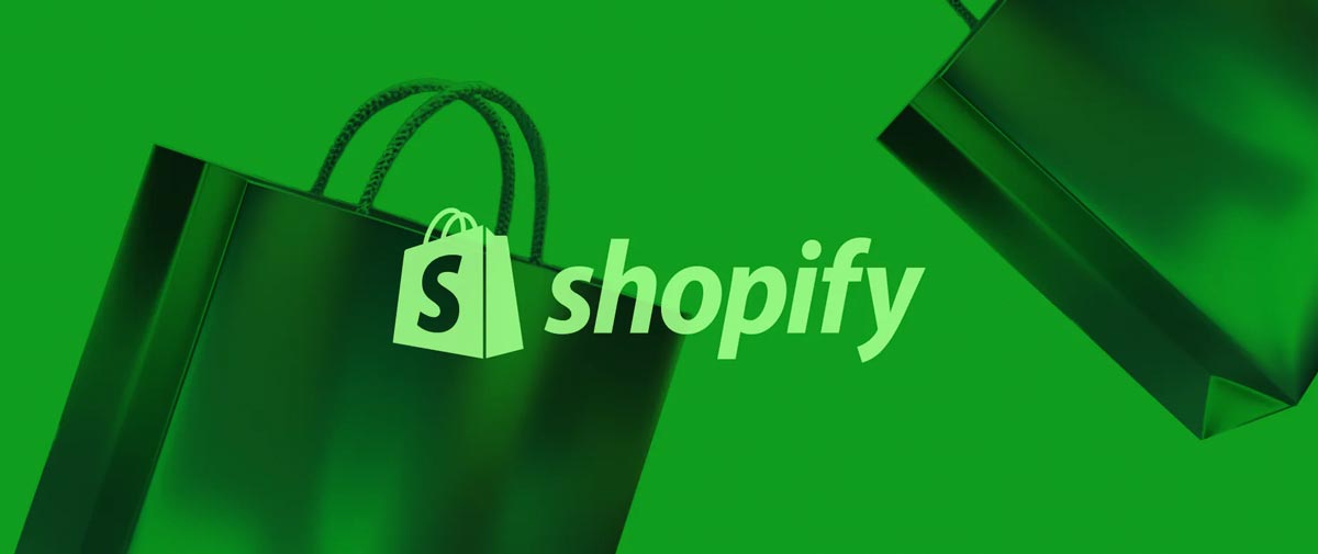 shopify logo on top of shopping bags