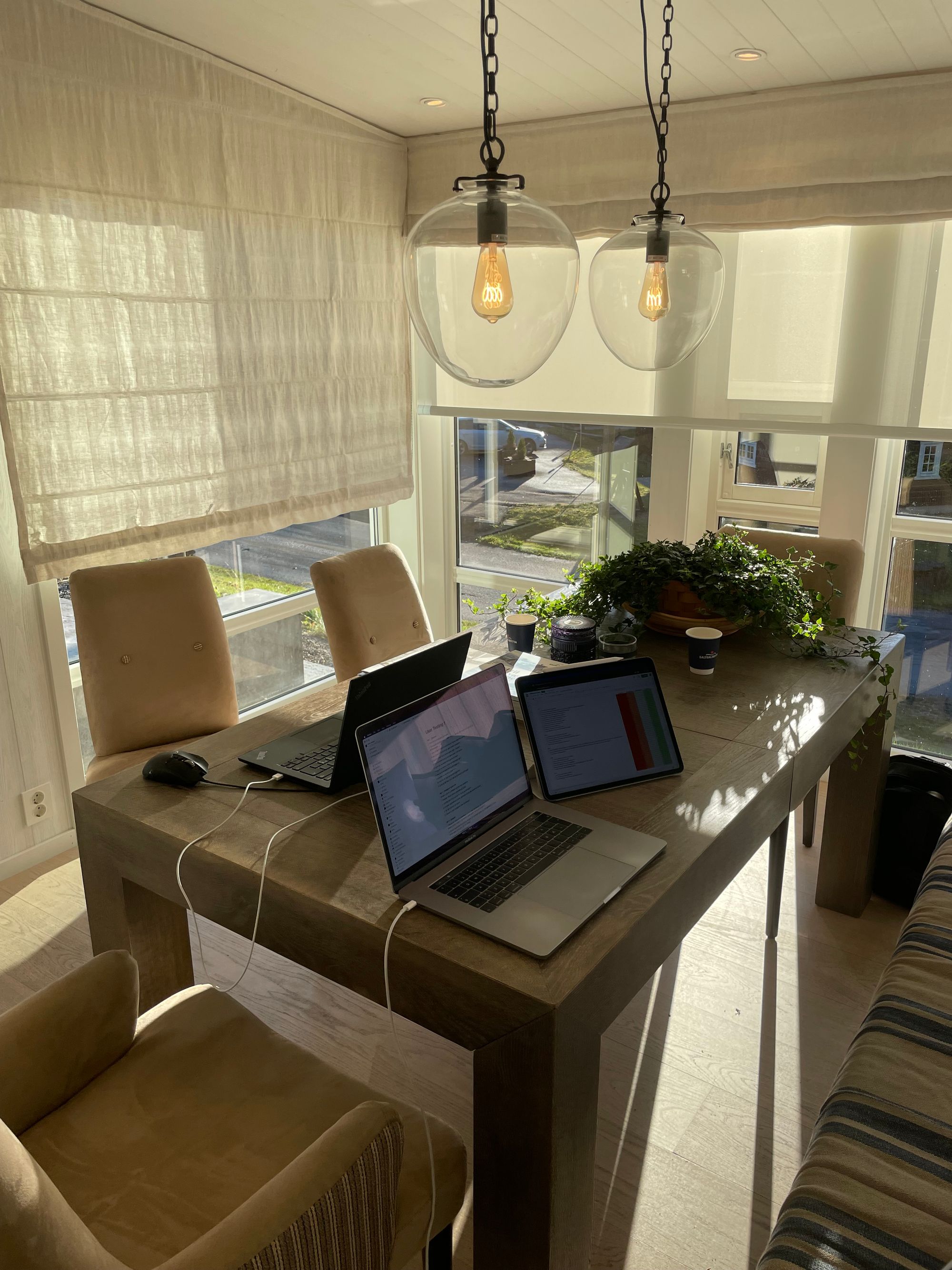 Laptops on a work desk during a workshop around user testing